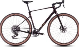 Vélo de Gravel Cube Nuroad C:62 SLX Sram Force eTap AXS/XX SL Eagle AXS 12V 700 mm Orange Violet Solareclipse 2025